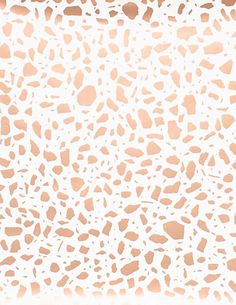 an animal print pattern with white and brown spots