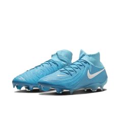 the nike vapor soccer shoe is shown in light blue and white, with silver accents