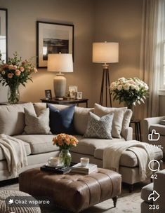 a living room filled with furniture and flowers in vases on the table next to a window