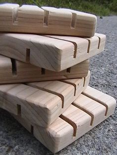 several pieces of wood stacked on top of each other