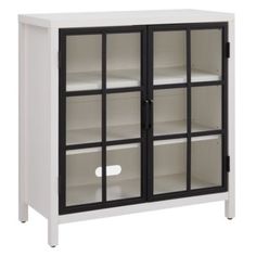 a white and black cabinet with glass doors