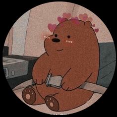 a brown teddy bear sitting on top of a couch next to a window with hearts