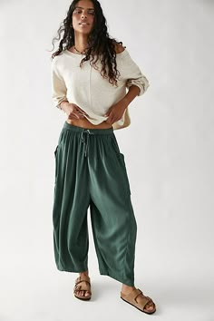 Your newest go-to summer pants from our Endless Summer collection, featured in a billowy, harem-inspired silhouette with dropped side pockets for added dimension.* Elastic waistband* Drawstring detail* Lightweight, effortless design Womens Hemp Pants, Free People Comfy Tops, Wild Legs Pants, Boho Cotton Pants, Summer Outfits Comfy Casual, Yoga Style Fashion, Wide Leg Yoga Pants Outfit, Quinn Pants, Womens Linen Clothes