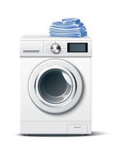 a white washing machine with stacks of blue towels on top of the washer's front