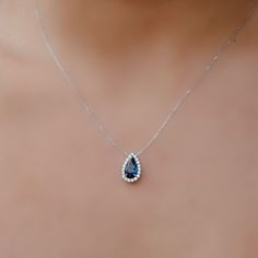 This one of a kind pendant is fit for royalty! Boasting a high quality royal blue sapphire, this necklace is sure to make jaws drop. Treat yourself like a princess and grab this stunner now! Wear with our matching ring. Natural Blue Sapphire: 3.07cts Natural Diamonds: 0.30ctw 14K White Gold Length: 16 Inches Sapphire Diamond Cut Necklace For Weddings, Hallmarked Sapphire Necklace For Wedding, Blue Sapphire Necklaces With Diamond Accents, Luxury Blue Necklaces With Single Cut Diamonds, Wedding Sapphire Necklace Hallmarked, Blue Diamond Necklace, Sapphire Diamond Necklace, Diamond Necklace Simple, Blue Sapphire Diamond