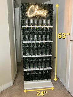 a wine rack with glasses on it and the measurements for each glass in front of it