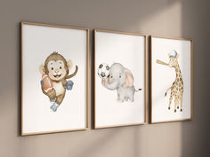 three pictures of animals hanging on the wall