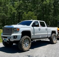 a large white truck parked in a parking lot