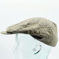 "-Vintage  ascot beige, green, and black cross stitched classic newsboy hat with brim snap buttons and side rivet holes for ventilation -Quaker Marine Supply and Made in USA makers marks -Hat is made of 100% silk herrringbone tweed -Soft, smooth, and comfortable material -Great vintage condition -Classic and elegant statement piece! Width: 10\" / 25.4 cm Height: 7\" / 17.8 cm Depth: 10 1/2\" / 26.7 cm Circumference: 21\" / 53.3 cm"