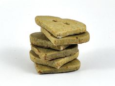 a stack of crackers sitting next to each other on top of a white surface