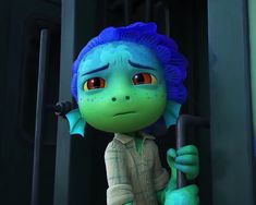 an animated character with blue hair and orange eyes holding a black object in his hand