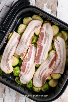 bacon and brussel sprouts in a black container