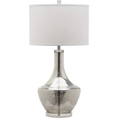 a silver table lamp with a white shade