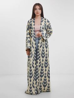 100% cotton ikat dress kimono robe handwoven maxi summer dress national Uzbek dress and professionally made and designed by the Bonu Collectives team, ready to be worn over any outfit from casual to abayas for spring and summer. This is a standard size meaning it's supposed to fit all S/M/L sizes according to preference. The arm length can be adjusted through folding. Feel free to message us with any questions. We recommend professionally dry cleaning. Uzbek Dress, Maxi Dress Elegant, Maxi Summer Dress, Dress Loose Fit, Kimono Maxi Dress, Loose Fit Dress, Dress Book, Ikat Dress, Dress Kimono