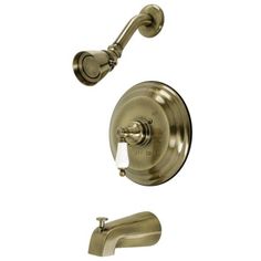 an antique brass finish shower faucet with hand shower head