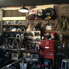 a room filled with lots of assorted items and clutter on top of shelves