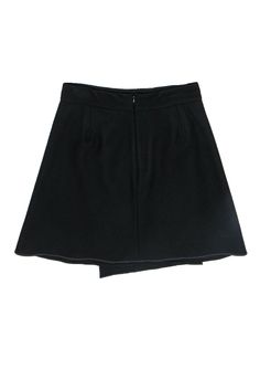 Go bold and a bit refined with this classic wool blend skirt from Carven! Perfect for wearing with turtlenecks, crisp blouses and your favorite loafers, this asymmetric beauty is a daytime sophisticated piece that is sure to be your newest preppy staple. Size 8 (FR 40) 80% Wool, 20% Polyamide A-line silhouette Asymmetric draped design Single exterior pocket Fully lined Zippered back Waist 30" Total length 22" Chic A-line Wool Bottoms, Formal Asymmetrical Lined Bottoms, Elegant Formal Bottoms With Asymmetrical Hem, Elegant Bottoms With Asymmetrical Hem For Formal Events, Elegant Formal Skirt With Asymmetrical Hem, Elegant Wool Mini Skirt, Elegant Winter Mini Skirt For Work, Elegant Mini Skirt With Asymmetrical Hem For Work, Elegant Asymmetrical Hem Mini Skirt For Work