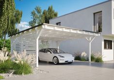 a white car parked in front of a house with a pergolated roof over it