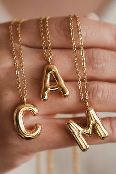 18K Gold Dipped Non-Tarnish Stainless Steel Initial Necklace. Approx. 18" long, no extender. The necklace is hypoallergenic, waterproof, fade-resistant, and tarnish-free, ensuring its beauty lasts for a long time. Looks great worn on its own or layered with our other stainless steel necklaces. Bubble Initial Necklace | Balloon Letter Necklace | Letter Charm Necklace | Initial Pendant Necklace | Name Necklace | Monogram Necklace | Real Gold Dipped Necklace | Real Gold Plated Necklace | Waterproof Necklaces Letter, Blue Embroidered Top, Chain Scarf, Bubble Letter, Necklace Initial, Bubble Letters, Initial Necklace Gold, Letter Charm, Initial Pendant Necklace