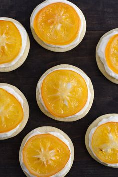 several orange slices are arranged on top of each other to make cookies for desserts