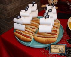 there are many hot dogs on the plate