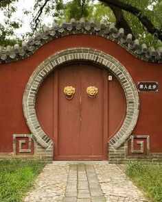 a red door with two lions on it