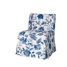 an upholstered chair with blue and white flowers on the back, against a white background