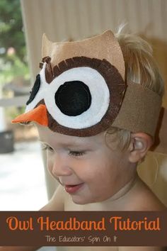 a young child wearing an owl headband with the words out, headband tutor on it