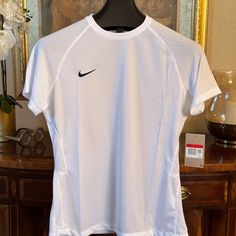 Nike Dri Fit Women’s Athletic Shirt. Nwt, Size L, Msrp $50.00 At Nike.Com Or Select Retailers. Dryfit Shirt Women, Dri Fit Shirt Women Outfit, Nike Classic Fitted Tops, Classic Fitted Nike Tops, Classic White Nike Tops, Track Wishlist, Sports Shirt Outfit, Nike Compression Shirt, Basketball Fits