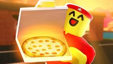 a lego man holding a pizza in his hand