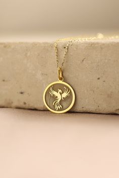 Gold Phoenix Pendant - Phoenix Gold Necklace ● Material of pendant: Solid Gold 14k ( REAL GOLD ) ● Metal Stamp: 14k ( REAL GOLD ) ● The pendant is available in 5 sizes: - 12,7 mm / 0.5 inches (Diameter) - 14,0 mm / 0,55 inches ( Diameter ) In the photos - 15,3 mm / 0.6 inches ( Diameter ) - 16,5 mm / 0,65 inches ( Diameter ) - 19,1 mm / 0,75 inches ( Diameter ) ( In the photos the size is 14mm / 0.55 inches Diameter ) ( Jump Ring inner diameter: 4 mm ) ● Material of chain: Solid gold 14k ( REAL Phoenix Necklace Pendants, Phoenix Jewelry Necklaces, Phoenix Ring, Phoenix Jewelry, Gold Pendent, Eagle Necklace, Phoenix Pendant, Phoenix Necklace, Gold Eagle