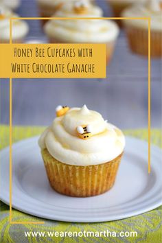 Cupcake with swirled vanilla frosting and little honey bee decorations and honey drizzle on a white plate with more cupcakes in background Easter Cupcake Recipes, Honey Cupcakes, Bee Cupcakes, Chocolate Honey, White Chocolate Ganache, Easter Cupcakes, Sweetest Thing, Fun Cupcakes, Savoury Cake