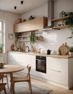 a kitchen with white walls and wooden floors, open shelving above the stove is filled with potted plants