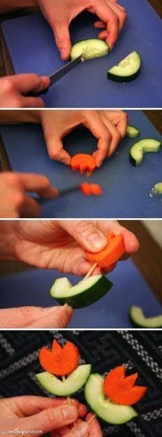 someone cutting cucumbers with a knife on top of a blue surface and then using them to cut the cucumber