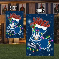 two side by side christmas yard signs in front of a house with lights on them