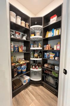 an open pantry with lots of food in it