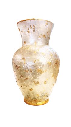 a white vase with gold speckles on the outside and inside, against a white background