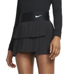 Nike Dri Fit Black Pleated And Tiered Skirt Size Xs. New. Nwt Black Fitted Tiered Tennis Skirt, Black Pleated Tiered Skort, Nike Fitted Tennis Skirt, Nike Fitted Mini Skort, Black Tiered Pleated Skort, Nike Pleated Skirt For Spring, Fitted Black Tiered Skort, Nike Pleated Skirt Fitted Bottoms, Nike Fitted Pleated Skirt