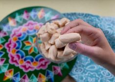 a person is holding food in their hand