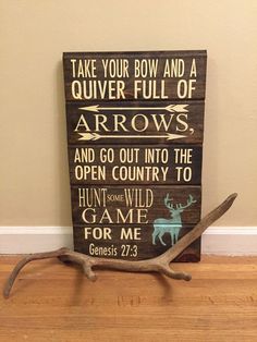 a wooden sign that says take your bow and a quilver full of arrows and go out into the open country to hunt wild game for me