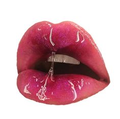 a woman's lips with pink glitter on them and a knife sticking out of the lip