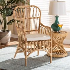 a wicker chair and side table in a living room