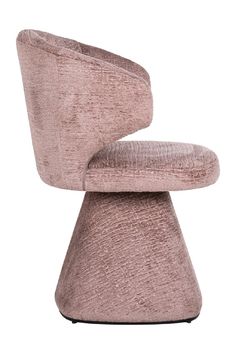 an upholstered chair with a rounded back and foot rest, in pink fabric