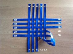 blue ribbon on wooden table with measurements for each piece in the package and price label