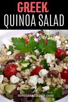 greek quinoa salad with tomatoes, cucumber and feta cheese in a white bowl