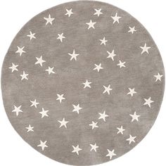 a round rug with white stars on it in grey and white colors, against a white background