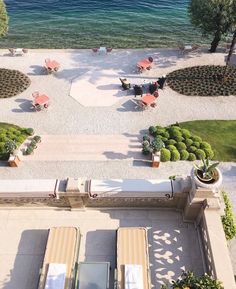 an aerial view of the beach and pool area