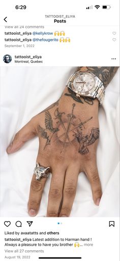 a person's hand with tattoos on it and a wrist watch in the background