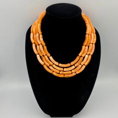 Elevate your style with our Vibrant Neon Orange Chunky Beaded Necklace. This multi-strand statement piece is handmade and perfect for adding a bold, stylish touch to any outfit. This is a handcrafted necklace, uniquely designed with attention to every detail. - Necklace length is 17.5" shortest strand plus additional 4 inch extender chain for length adjustment. Matching earrings are available. Select from the option drop-down menu "necklace + earrings" to get the earrings with the necklace.  Mad Orange Statement Necklace, Autumn Necklace, Orange Necklace, Christmas Necklace, Beaded Statement Necklace, Handcrafted Necklace, Halloween Jewelry, Multi Strand Necklace, Stylish Jewelry