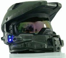 a close up of a helmet with goggles on the face and lights in the visor